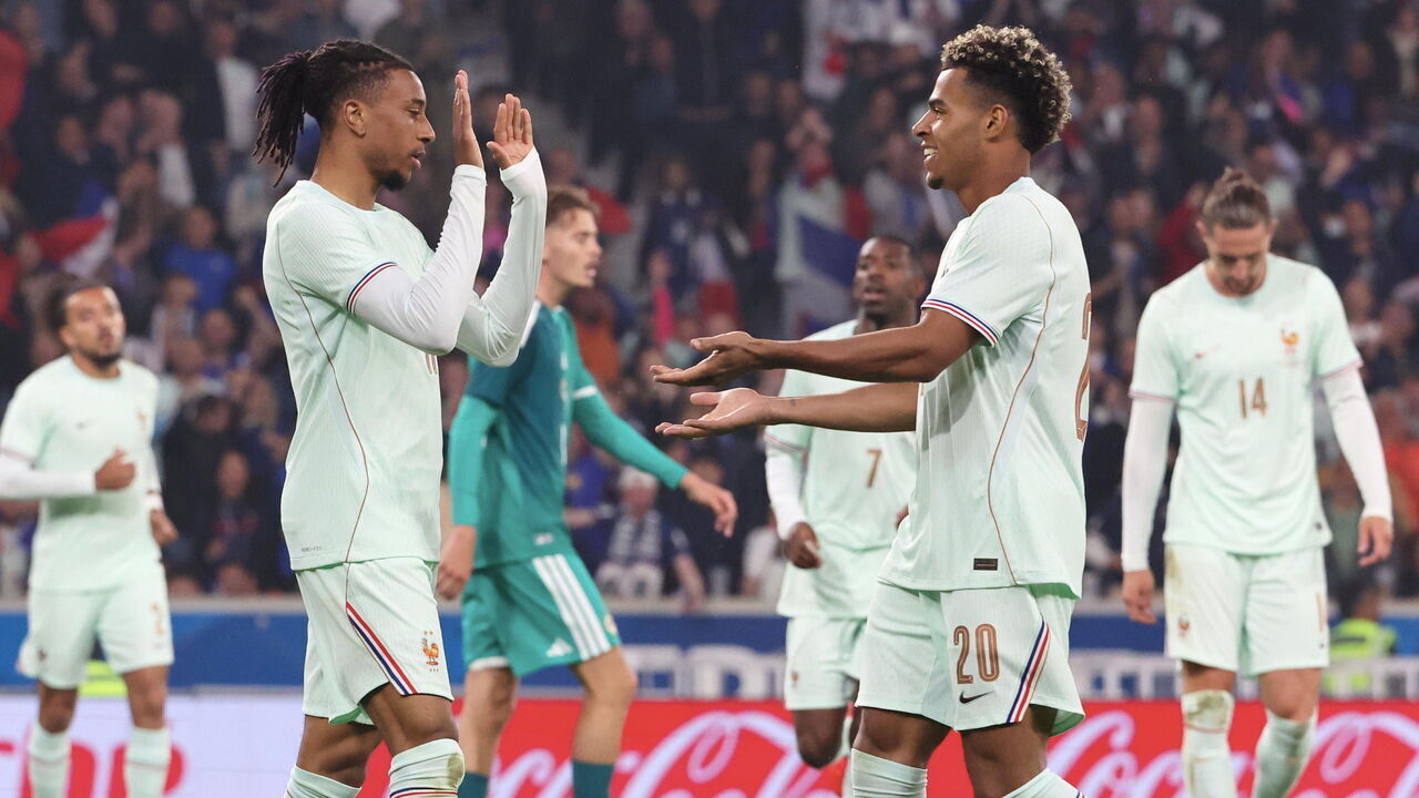 LILLE, FRANCE - JUNE 08: Michael Olise #11 of Team France celebrate his second goal with Désiré Doué #14during the International Friendly match between France and Northern Ireland at Stade Pierre Mauroy on June 08, 2026 in Lille, France.