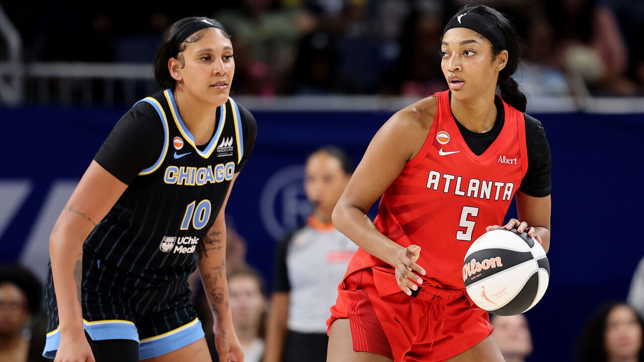 CHICAGO, ILLINOIS - JUNE 09: Angel Reese #5 of the Atlanta Dream is defended by Kamilla Cardoso #10 of the Chicago Sky during the second half at Wintrust Arena on June 09, 2026 in Chicago, Illinois.