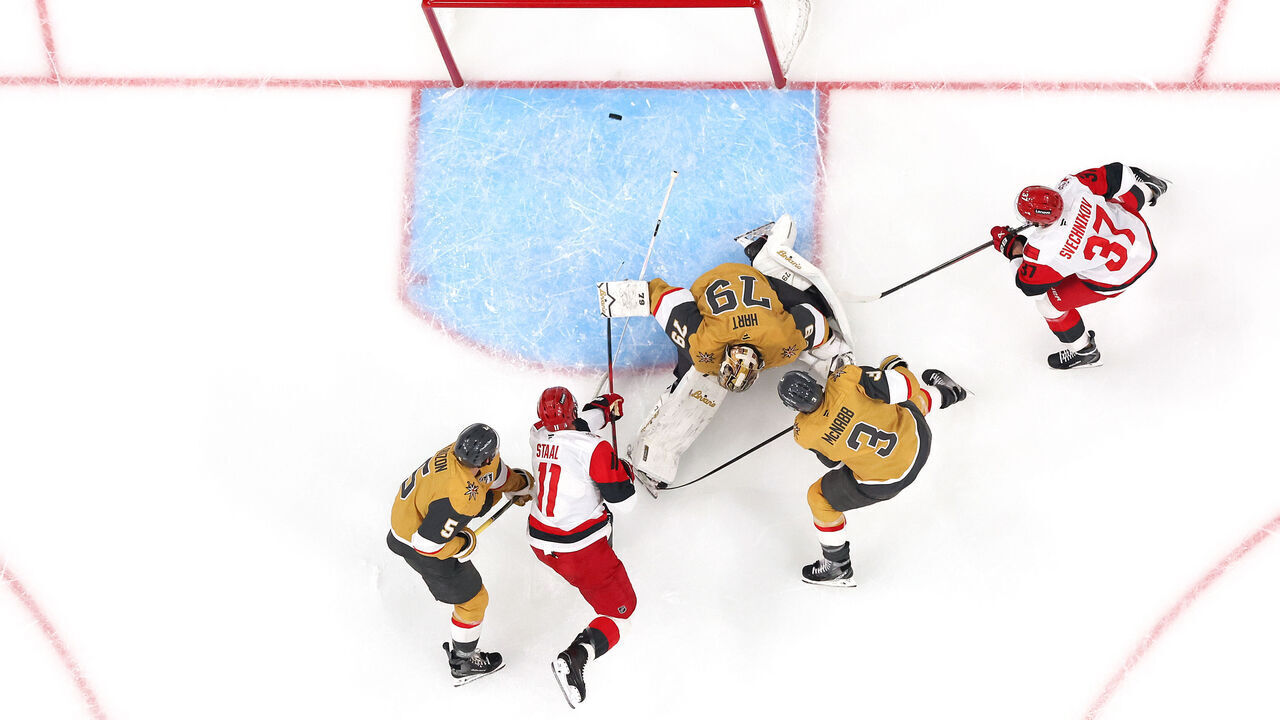 LAS VEGAS, NEVADA - JUNE 09: Jordan Staal #11 of the Carolina Hurricanes scores a first period goal on Carter Hart #79 of the Vegas Golden Knights in Game Four of the 2026 Stanley Cup Final at T-Mobile Arena on June 09, 2026 in Las Vegas, Nevada.