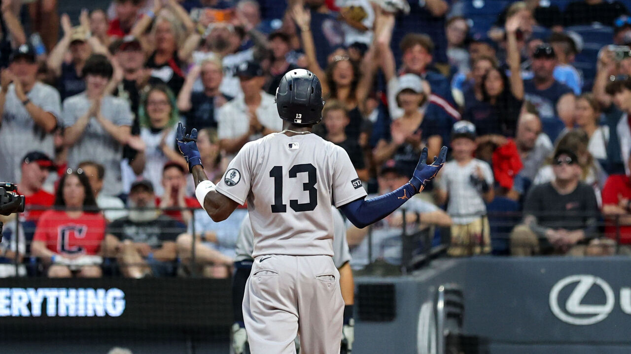 CLEVELAND, OH - JUNE 09: New York Yankees fans in the stands celebrate along with New York Yankees second baseman Jazz Chisholm Jr. (13) after Chisholm Jr. (13) hit a home run during the eighth inning of the Major League Baseball game between the New York Yankees and Cleveland Guardians on June 9, 2026, at Progressive Field in Cleveland, OH.