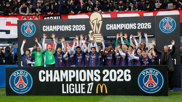 PSG's players celebrate at the awarding ceremony for the Champions 2026 Ligue 1 prior to the match between Paris FC and Paris Saint-Germain PSG in Paris, France, May 17, 2026.