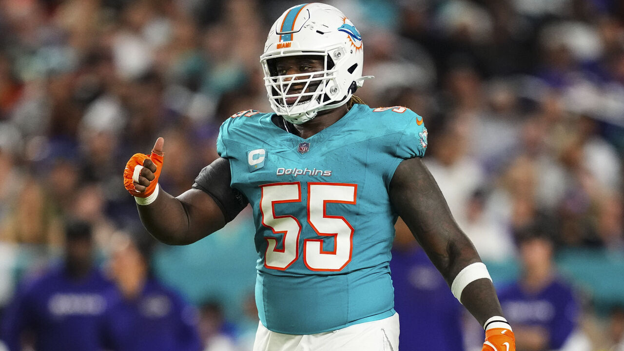 MIAMI GARDENS, FL - OCTOBER 30: Aaron Brewer #55 of the Miami Dolphins looks on from the field during an NFL football game against the Baltimore Ravens at Hard Rock Stadium on October 30, 2025 in Miami Gardens, Florida.
