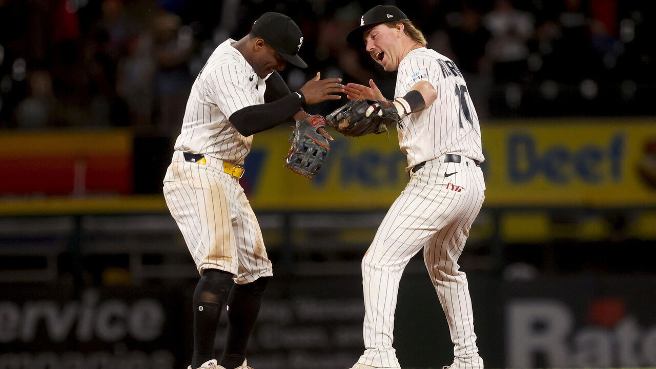 CHICAGO, ILLINOIS - JUNE 10: Luisangel Acuña #0 and Chase Meidroth #10 of the Chicago White Sox celebrate together after securing the win over the Atlanta Braves at Rate Field on June 10, 2026 in Chicago, Illinois.