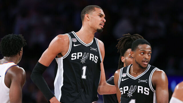 NEW YORK, NEW YORK - JUNE 08: Victor Wembanyama #1 of the San Antonio Spurs and De'aaron Fox #4 of the San Antonio Spurs react during the fourth quarter against the New York Knicks in Game Three of the 2026 NBA Finals at Madison Square Garden on June 08, 2026 in New York City.