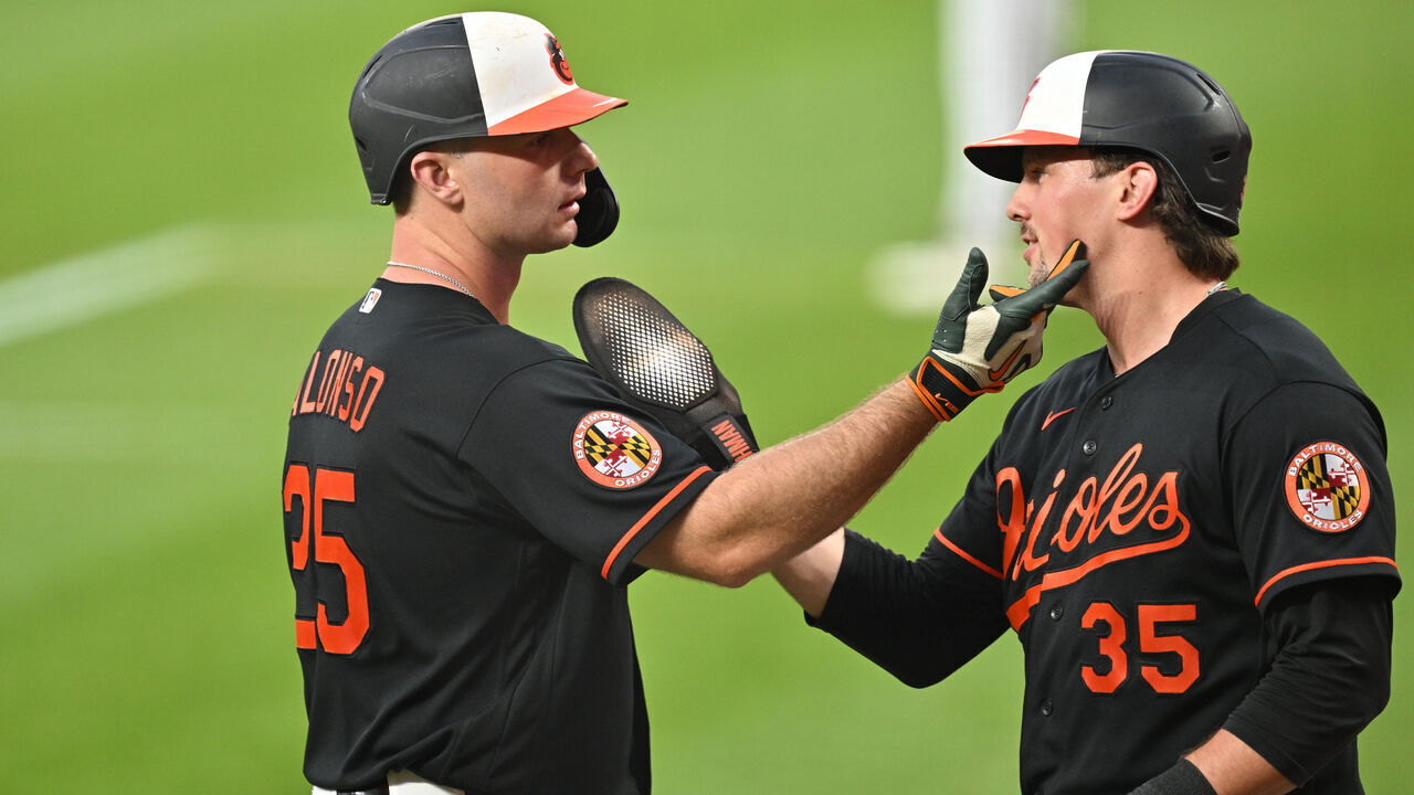 BALTIMORE, MD - JUNE 11: Pete Alonso #25 and Adley Rutschman #35 of the Baltimore Orioles celebrate together after Alonso hit a two-run home run in the third inning against the Seattle Mariners at Oriole Park at Camden Yards on June 11, 2026 in Baltimore, Maryland.