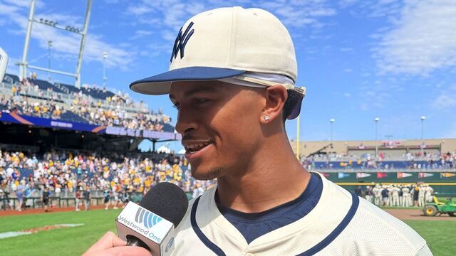 West Virginia beats Troy in both teams' College World Series debut