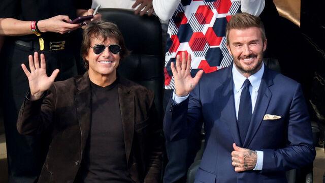 INGLEWOOD, CA - JUNE 12, 2026: Sir David Beckham, right, and Tom Cruise waves to fans before the World Cup group stage match between United States and Paraguay at the SoFi Stadium on Friday, June 12, 2026 in Inglewood, CA. (Allen J. Schaben / Los Angeles Times via Getty Images)