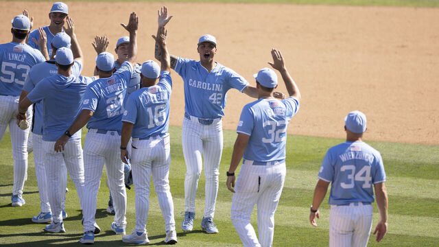 CHAPEL HILL, NC - JUNE 06, 2026: North Carolina Tar Heels Boston Flannery (42) celebrates with teammates after game 2 of an NCAA baseball super regional against the USC Trojans at Bryson Field at Boshamer Stadium on Saturday, June 6, 2026 in Chapel Hill, NC. (Kara Durrette / Los Angeles Times via Getty Images)