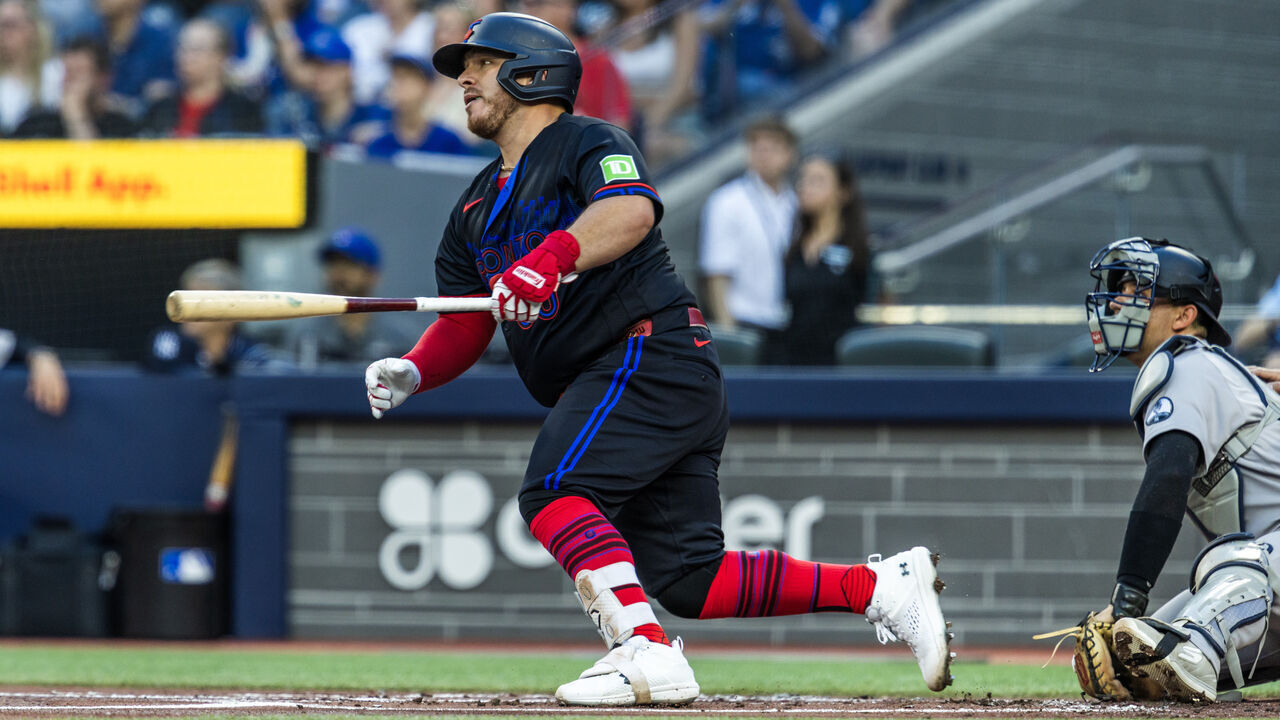 TORONTO, CANADA - JUNE 12: Alejandro Kirk #30 of the Toronto Blue Jays hits a double against the New York Yankees during the first inning in an MLB game at the Rogers Centre on June 12, 2026 in Toronto, Ontario, Canada.
