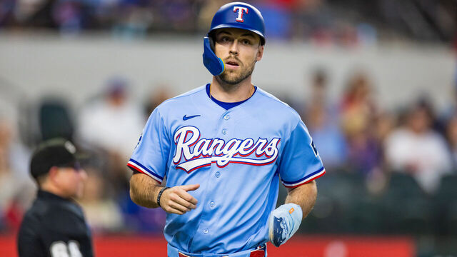 ARLINGTON, TEXAS - JUNE 07: Evan Carter #32 of the Texas Rangers runs across the field during a game against the Cleveland Guardians at Globe Life Field on June 07, 2026 in Arlington, Texas.