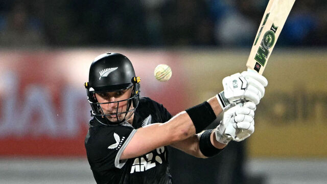 New Zealand's Will Young plays a shot during the second one-day international (ODI) cricket match between India and New Zealand at Niranjan Shah Stadium in Rajkot on January 14, 2026. / -- IMAGE RESTRICTED TO EDITORIAL USE - STRICTLY NO COMMERCIAL USE --
