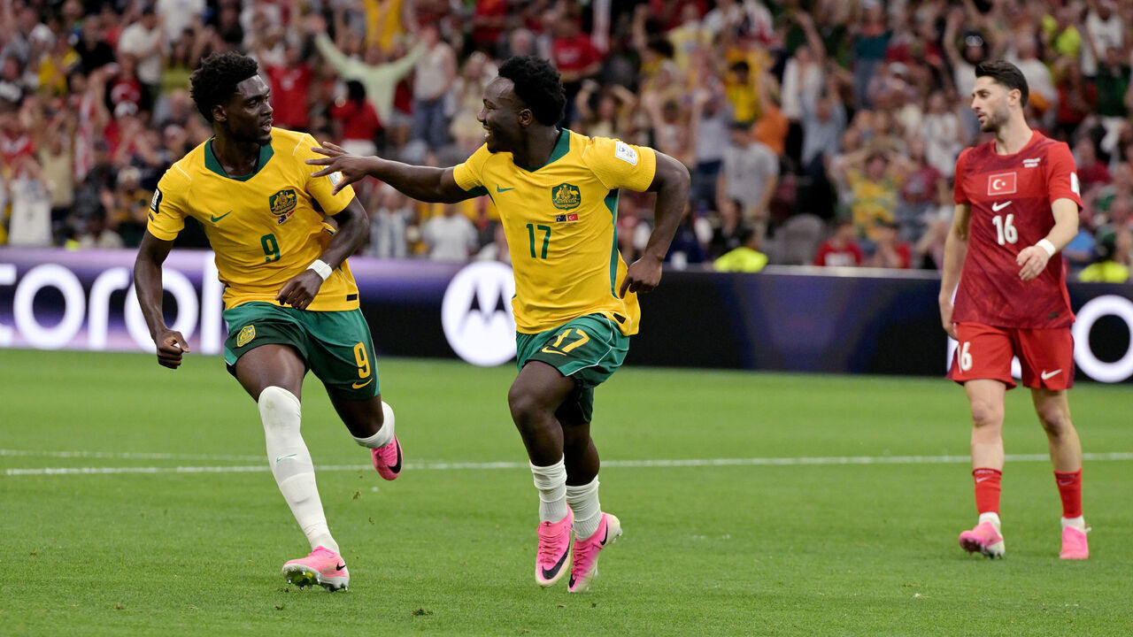 VANCOUVER, CANADA - JUNE 13: Nestory Irankunda of Australia celebrates 1-0 with Mohamed Toure of Australia during the World Cup match between Australia v Turkey at the Vancouver Stadium on June 13, 2026 in Vancouver Canada