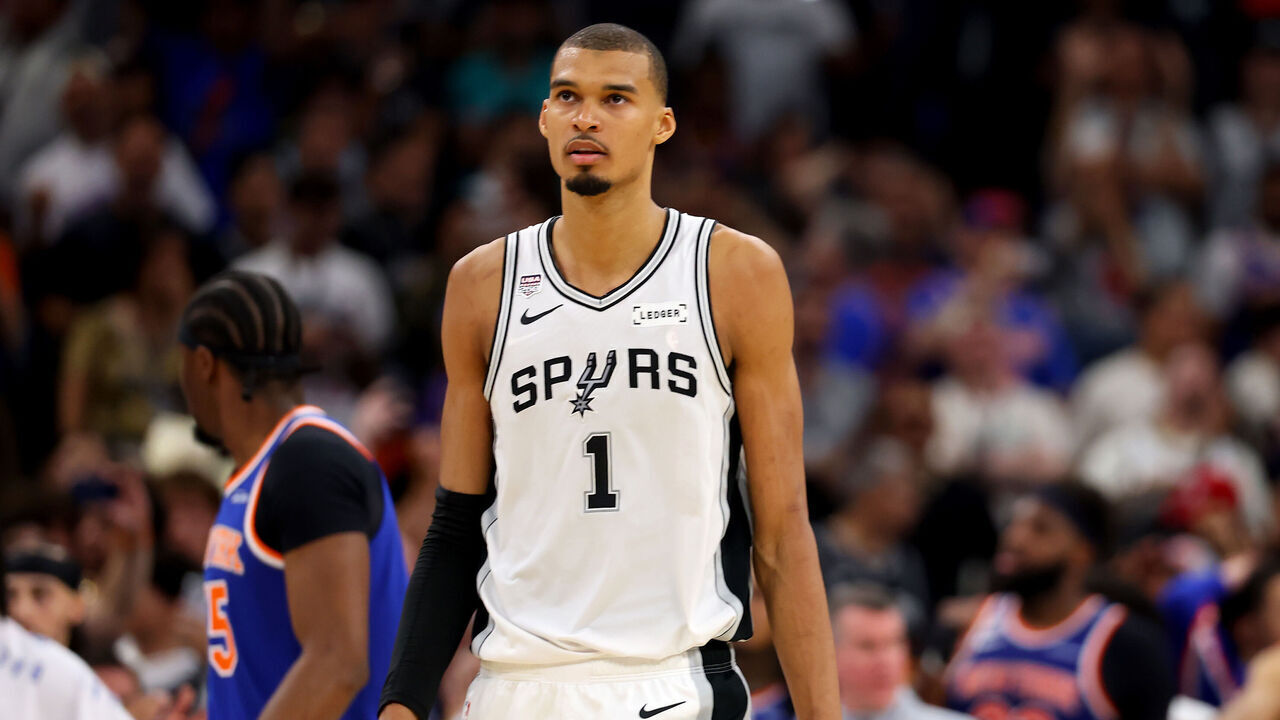 SAN ANTONIO, TEXAS - JUNE 13: Victor Wembanyama #1 of the San Antonio Spurs reacts during the fourth quarter against the New York Knicks in Game Five of the 2026 NBA Finals at Frost Bank Center on June 13, 2026 in San Antonio, Texas.