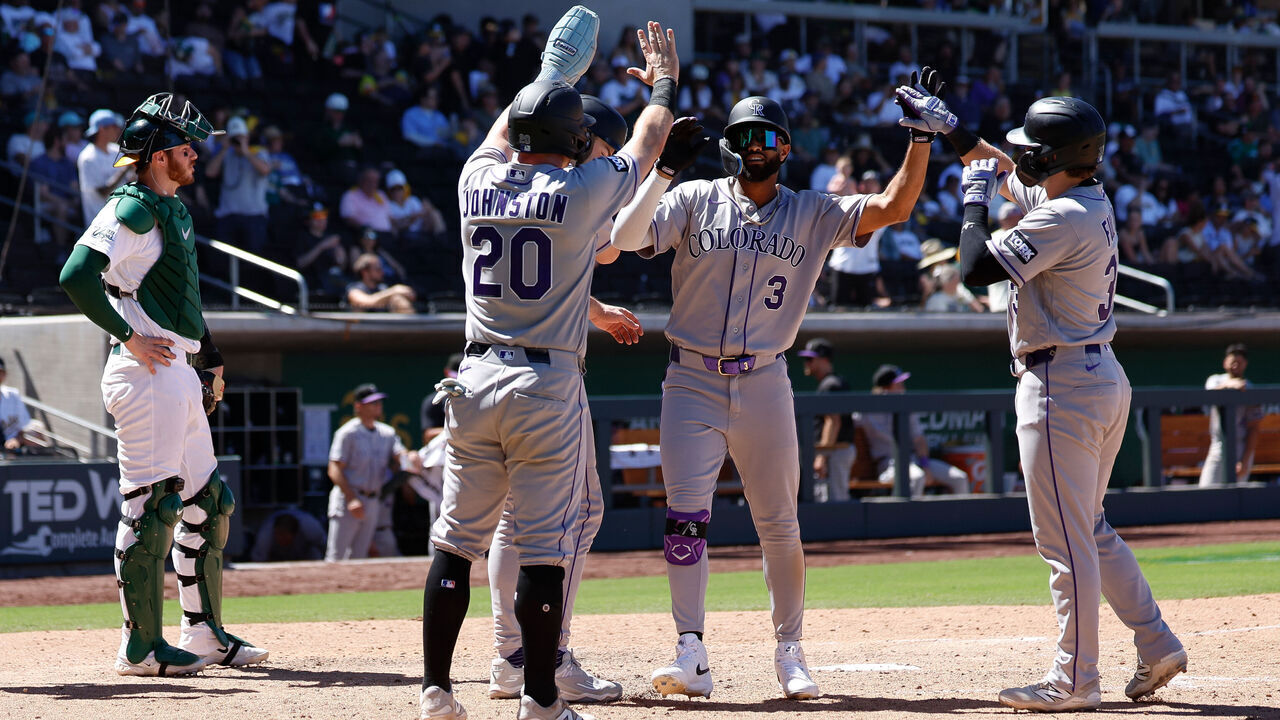 LAS VEGAS, NEVADA - JUNE 14: Willi Castro #3 of the Colorado Rockies celebrates with teammates after hitting a grand slam in the eighth inning during a game against the Athletics at Las Vegas Ballpark on June 14, 2026 in Las Vegas, Nevada.