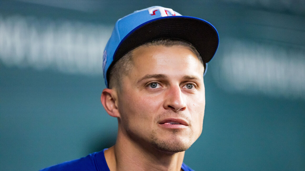ARLINGTON, TEXAS - JUNE 07: Corey Seager #5 of the Texas Rangers walks through the dugout before a game against the Cleveland Guardians at Globe Life Field on June 07, 2026 in Arlington, Texas.