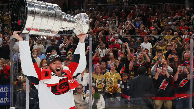 LAS VEGAS, NEVADA - JUNE 14: Taylor Hall #71 of the Carolina Hurricanes lifts the Stanley Cup after Game Six of the 2026 Stanley Cup Final against the Vegas Golden Knights at T-Mobile Arena on June 14, 2026 in Las Vegas, Nevada. The Carolina Hurricanes won 3-0.