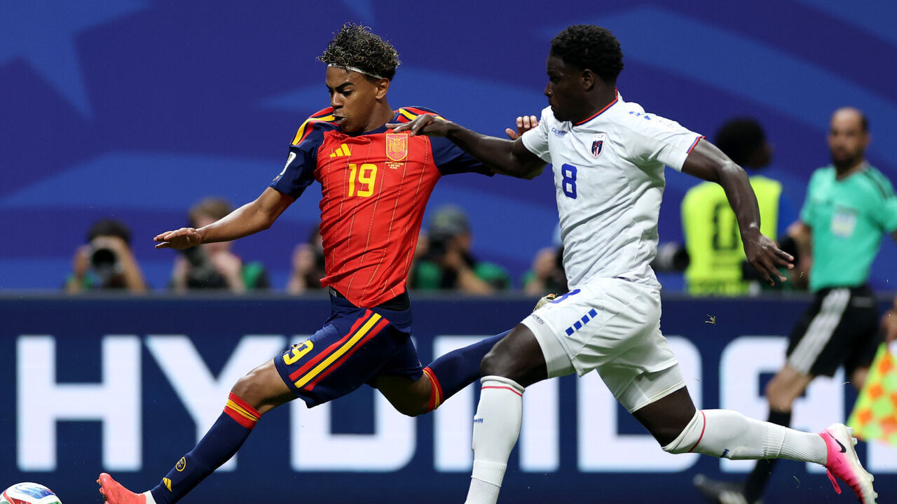 ATLANTA, GEORGIA - JUNE 15: Lamine Yamal #19 of Spain is challenged by Joao Paulo #8 of Cabo Verde during the FIFA World Cup 2026 Group H match between Spain and Cabo Verde at Atlanta Stadium on June 15, 2026 in Atlanta, Georgia.