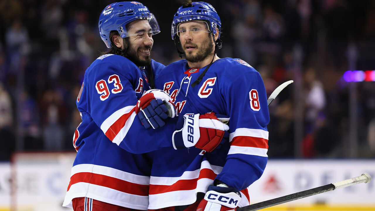 NEW YORK, NEW YORK - APRIL 04: Mika Zibanejad #93 and J.T. Miller #8 of the New York Rangers celebrate their win at Madison Square Garden on April 04, 2026 in New York City. The Rangers defeated the Red Wings 4-1.