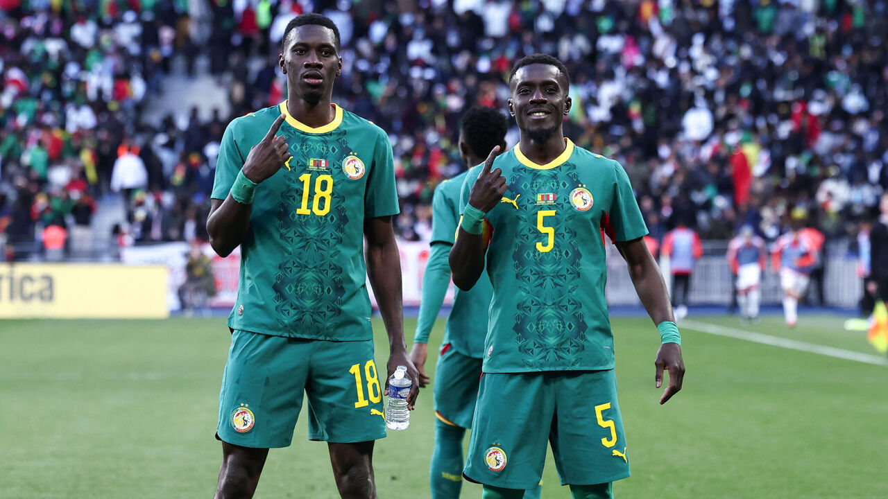 PARIS, FRANCE - MARCH 28: Ismaila Sarr #18 of Senegal celebrates scoring the second goal of his team with Idrissa Gueye #5 of Senegal during the international friendly match between Senegal and Peru at Stade de France on March 28, 2026 in Paris, France.