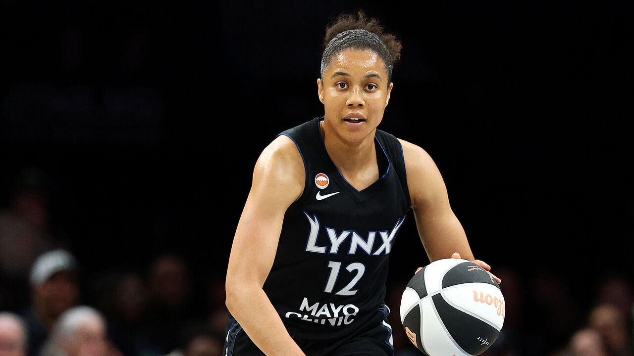 MINNEAPOLIS, MINNESOTA - JUNE 15: Nia Coffey #12 of the Minnesota Lynx dribbles the ball against the Portland Fire in the second quarter at Target Center on June 15, 2026 in Minneapolis, Minnesota.