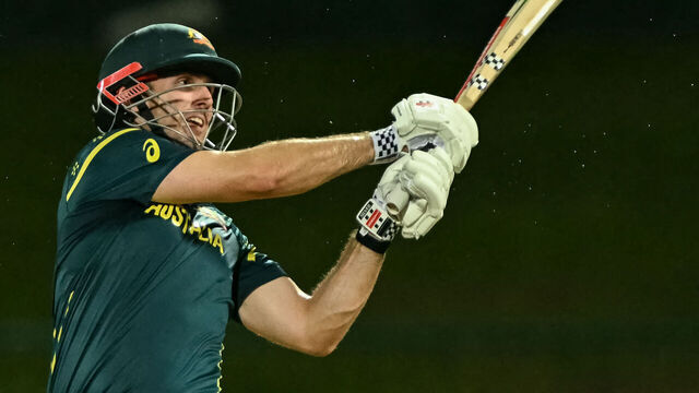 Australia's captain Mitchell Marsh plays a shot during the 2026 ICC Men's T20 Cricket World Cup group stage match between Oman and Australia at Pallekele International Cricket Stadium in Kandy on February 20, 2026.