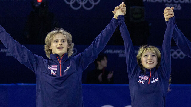 MILAN, ITALY - February 21: Team USA members Amber Glenn, Ilia Malinin, and Alysa Liu, react to the spectators after performing a routine during the Olympic Figure Skating Exhibition Gala at the Milano Ice Skating Arena at the Milano Cortina Winter Olympic Games 2026 on February 21st, 2026 in Milan, Italy.