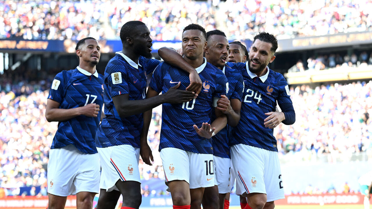 EAST RUTHERFORD, NEW JERSEY - JUNE 16: Kylian Mbappe #10 of France celebrates with teammates after scoring the team's second goal during the FIFA World Cup 2026 Group I match between France and Senegal at New York New Jersey Stadium on June 16, 2026 in East Rutherford, New Jersey.