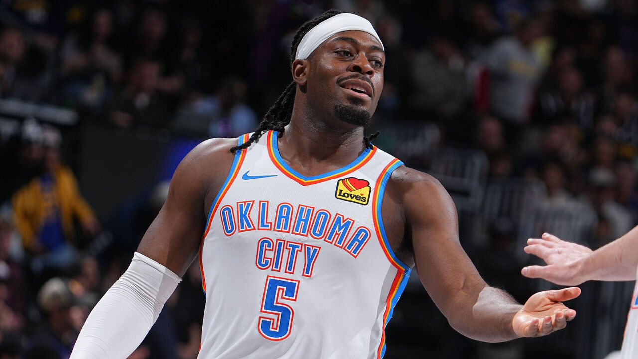 DENVER, CO - APRIL 10: Luguentz Dort #5 and Nikola Topic #44 of the Oklahoma City Thunder high five during the game against the Denver Nuggets on April 10, 2026 at Ball Arena in Denver, Colorado. NOTE TO USER: User expressly acknowledges and agrees that, by downloading and/or using this Photograph, user is consenting to the terms and conditions of the Getty Images License Agreement. Mandatory Copyright Notice: Copyright 2026 NBAE