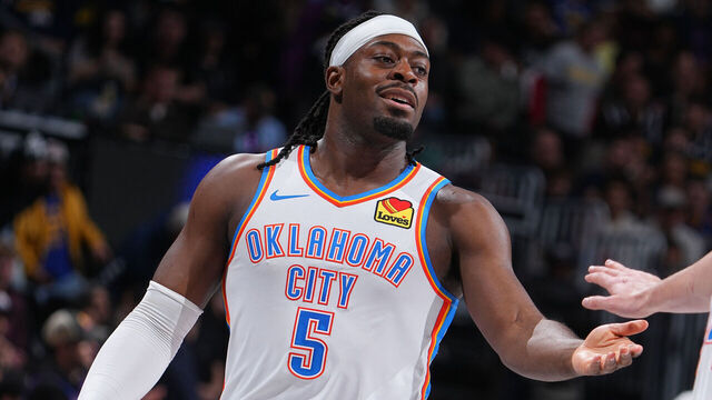 DENVER, CO - APRIL 10: Luguentz Dort #5 and Nikola Topic #44 of the Oklahoma City Thunder high five during the game against the Denver Nuggets on April 10, 2026 at Ball Arena in Denver, Colorado. NOTE TO USER: User expressly acknowledges and agrees that, by downloading and/or using this Photograph, user is consenting to the terms and conditions of the Getty Images License Agreement. Mandatory Copyright Notice: Copyright 2026 NBAE