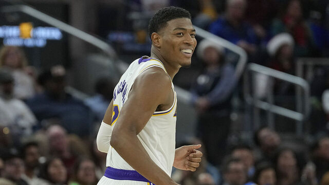SAN FRANCISCO, CALIFORNIA - DECEMBER 25: Rui Hachimura #28 of the Los Angeles Lakers reacts after making a three-point shot against the Golden State Warriors during the second half at Chase Center on December 25, 2024 in San Francisco, California.