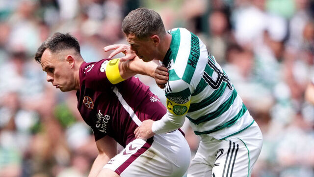 Heart of Midlothian's Lawrence Shankland and Celtic's Callum McGregor battle for the ball during the William Hill Premiership match at Celtic Park, Glasgow. Picture date: Saturday May 16, 2026.