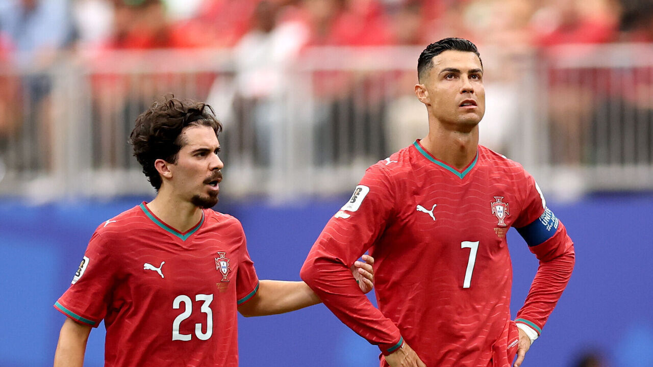 HOUSTON, TEXAS - JUNE 17: Cristiano Ronaldo #7 of Portugal reacts with teammates after conceding an equalizer to Yoane Wissa #20 of Congo DR during the FIFA World Cup 2026 Group K match between Portugal and Congo DR at Houston Stadium on June 17, 2026 in Houston, Texas.