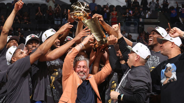 SAN ANTONIO, TX - JUNE 13: New York Knicks Owner James Dolan and the New York Knicks raise the Larry O'Brien Championship Trophy after winning the NBA Finals against the San Antonio Spurs during Game Five of the 2026 NBA Finals on June 13, 2026 at Frost Bank Center in San Antonio, Texas. Mandatory Copyright Notice: Copyright 2026 NBAE