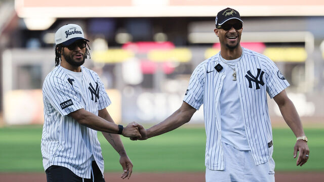 BRONX, NY - JUNE 17: New York Knick and NBA Champion Jalen Brunson, and teammate Josh Hart throw out the first pitch before a game between the Chicago White Sox and New York Yankees at Yankee Stadium on June 17, 2026 in the Bronx, New York.
