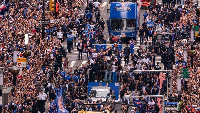NEW YORK, NEW YORK - JUNE 18: Thousands of fans gather in lower Manhattan for the New York Knicks Championship ticker-tape parade on June 18, 2026 in New York City. The New York Knicks celebrate during the Championship ticker tape parade and victory rally celebrating winning the 2026 NBA Finals on June 18, 2026 in New York City. The New York Knicks defeated the San Antonio Spurs in five games to win their first NBA Championship in 53 years.