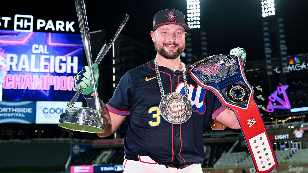 ATLANTA, GEORGIA - JULY 14: Cal Raleigh #29 of the Seattle Mariners poses with the trophy after winning the Home Run Derby at Truist Park on July 14, 2025 in Atlanta, Georgia.