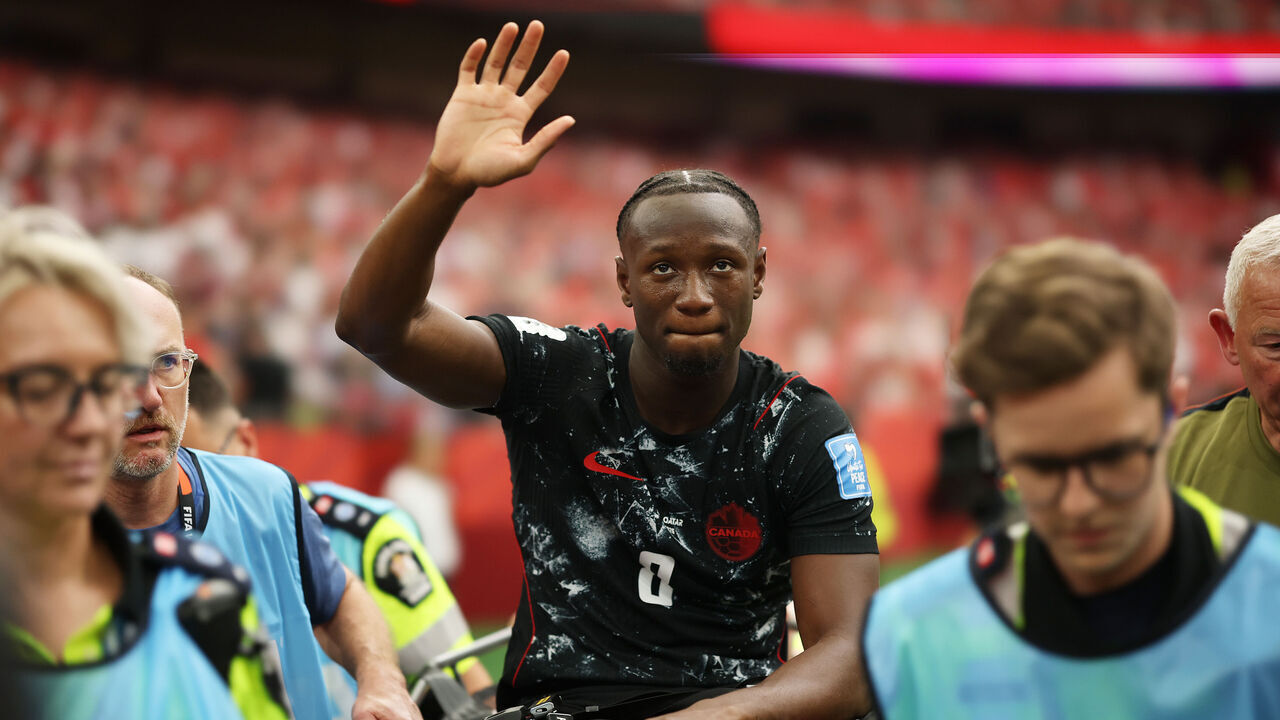 VANCOUVER, BRITISH COLUMBIA - JUNE 18: Ismael Kone #8 of Canada waves to crowd as he is stretched off after being fouled by Assim Madibo #23 of Qatar during the FIFA World Cup 2026 Group B match between Canada and Qatar at BC Place Vancouver on June 18, 2026 in Vancouver, British Columbia.