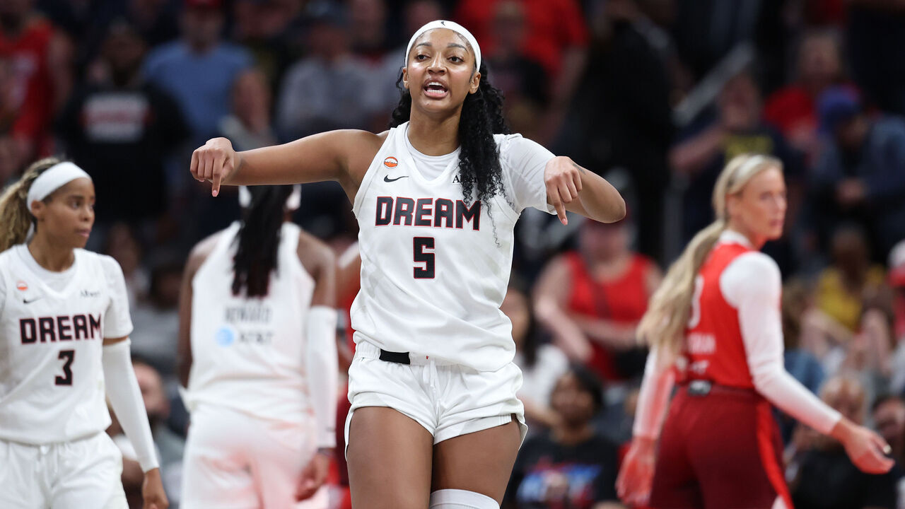 INDIANAPOLIS, INDIANA - JUNE 18: Angel Reese #5 of the Atlanta Dream celebrates in the game against the Indiana Fever at Gainbridge Fieldhouse on June 18, 2026 in Indianapolis, Indiana. NOTE TO USER: User expressly acknowledges and agrees that, by downloading and or using this photograph, User is consenting to the terms and conditions of the Getty Images License