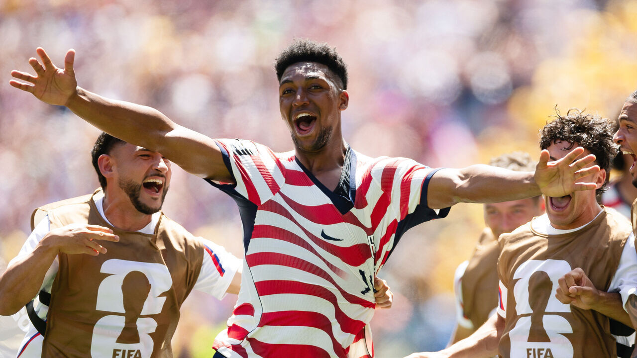 SEATTLE, WASHINGTON - JUNE 19: Alex Freeman of United States celebrates with his teammates after scoring his team's second goal during the FIFA World Cup 2026 Group D match between USA and Australia at Seattle Stadium on June 19, 2026 in Seattle, Washington.