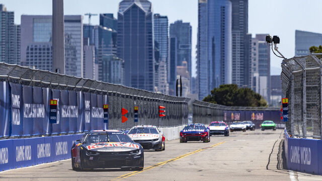 SAN DIEGO, CA - JUNE 20: Connor Zilisch of the #88 Trackhouse Racing Red Bull Chevrolet leads a pack around turn 8, during qualifying for the Anduril 250 NASCAR Cup Series Race, Saturday, June 20, 2026, at Naval Base Coronado in San Diego, California.