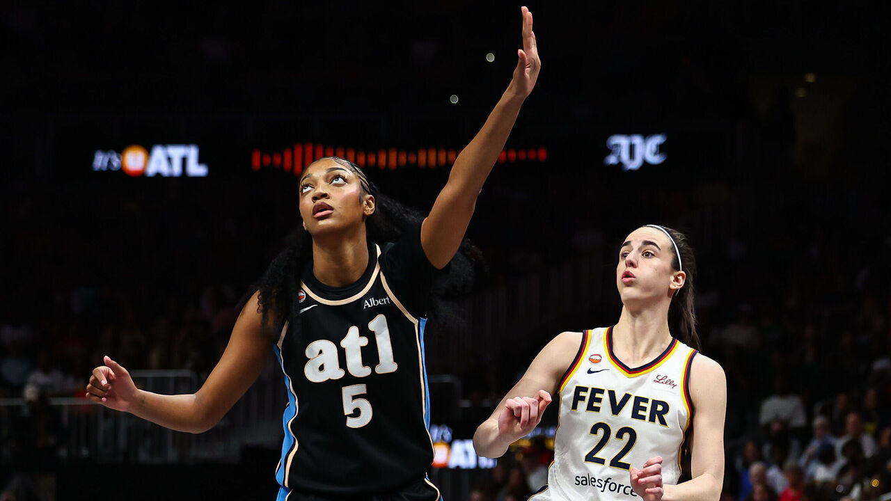 ATLANTA, GEORGIA - JUNE 20: Caitlin Clark #22 of the Indiana Fever shoots against Angel Reese #5 of the Atlanta Dream during the first quarter at State Farm Arena on June 20, 2026 in Atlanta, Georgia.