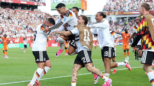 TORONTO, ONTARIO - JUNE 20: Deniz Undav #26 of Germany celebrates with teammates after scoring his team's second goal during the FIFA World Cup 2026 Group E match between Germany and Cote D'Ivoire at Toronto Stadium on June 20, 2026 in Toronto, Ontario.