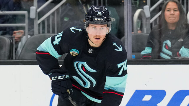 SEATTLE, WASHINGTON - APRIL 11: Bobby McMann #74 of the Seattle Kraken skates with the puck against the Calgary Flames during the second period at Climate Pledge Arena on April 11, 2026 in Seattle, Washington.