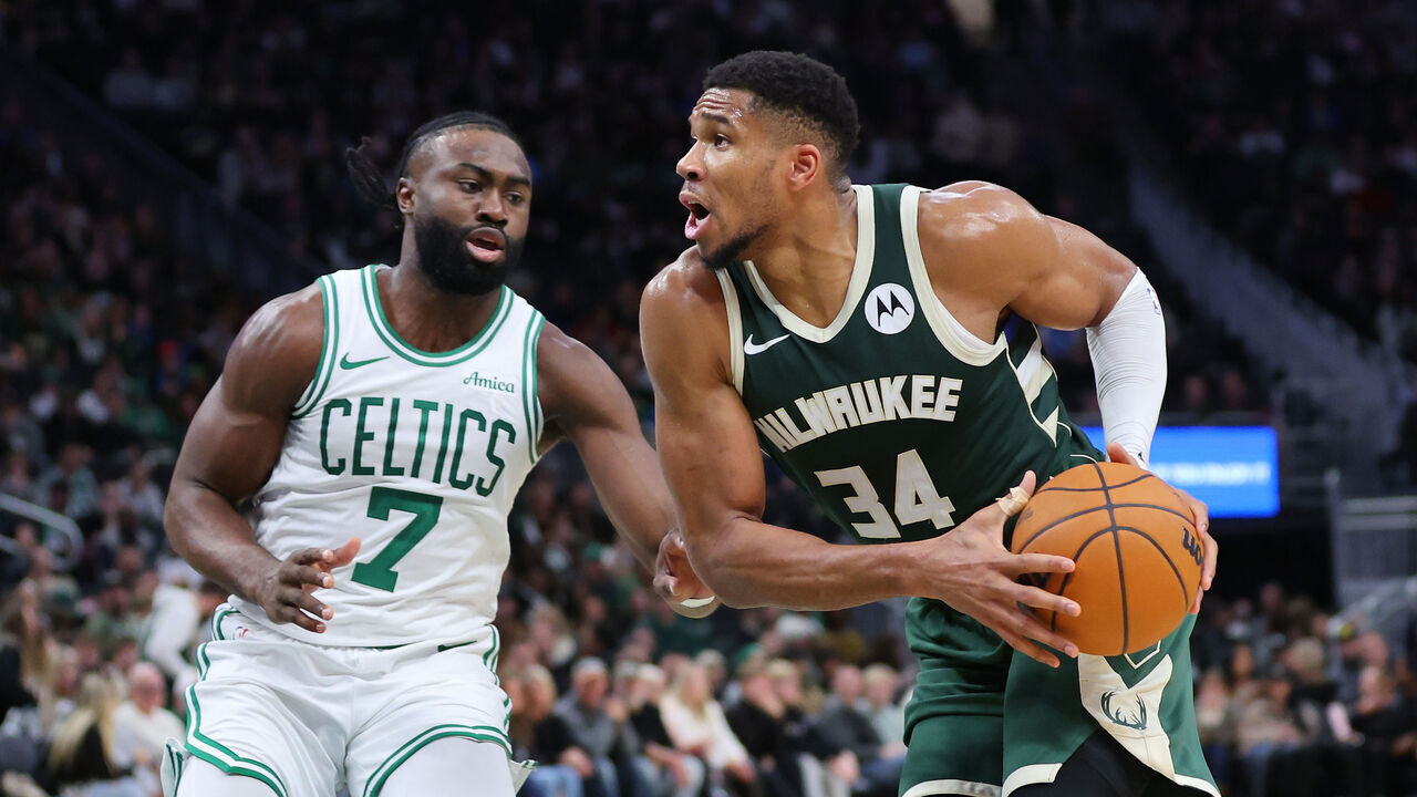 MILWAUKEE, WISCONSIN - NOVEMBER 10: Giannis Antetokounmpo #34 of the Milwaukee Bucks is defended by Jaylen Brown #7 of the Boston Celtics during a game at Fiserv Forum on November 10, 2024 in Milwaukee, Wisconsin.