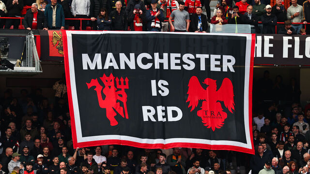 MANCHESTER, ENGLAND - MAY 17: A flag reads 'Manchester is Red' during the Premier League match between Manchester United and Nottingham Forest at Old Trafford on May 17, 2026 in Manchester, United Kingdom.