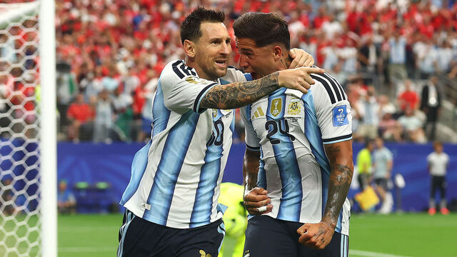 DALLAS, TEXAS - JUNE 22: Lionel Messi of Argentina celebrates scoring a goal to make the score 1-0 with Enzo Fernandez (R) during the FIFA World Cup 2026 Group J match between Argentina and Austria at Dallas Stadium on June 22, 2026 in Dallas, United States.