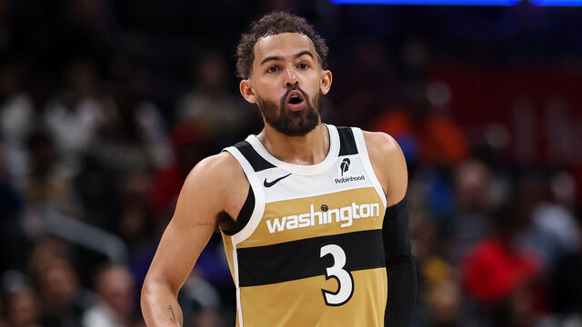 WASHINGTON, DC - MARCH 05: Trae Young #3 of the Washington Wizards reacts against the Utah Jazz during the second half at Capital One Arena on March 5, 2026 in Washington, DC.