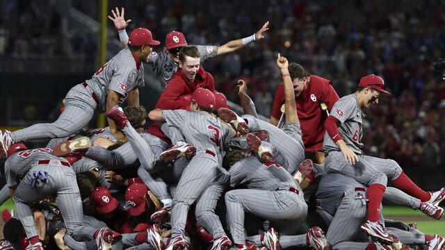 OMAHA, NEBRASKA - JUNE 22: The Oklahoma Sooners celebrate after defeating the North Carolina Tar Heels to win the Division I Baseball Championship held at Charles Schwab Field on June 22, 2026 in Omaha, Nebraska.