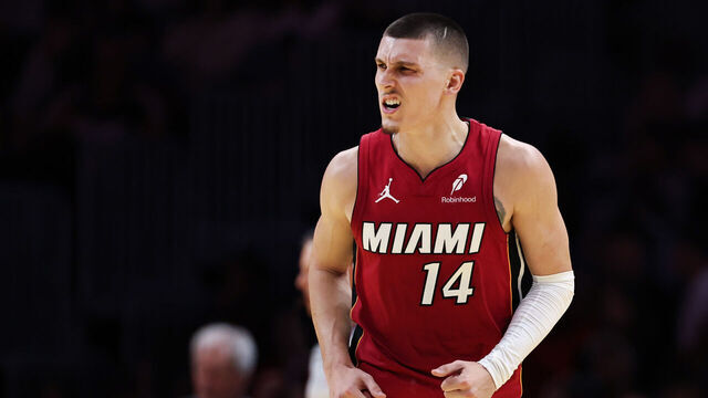 MIAMI, FLORIDA - NOVEMBER 26: Tyler Herro #14 of the Miami Heat reacts against the Milwaukee Bucks during the second half at Kaseya Center on November 26, 2025 in Miami, Florida.