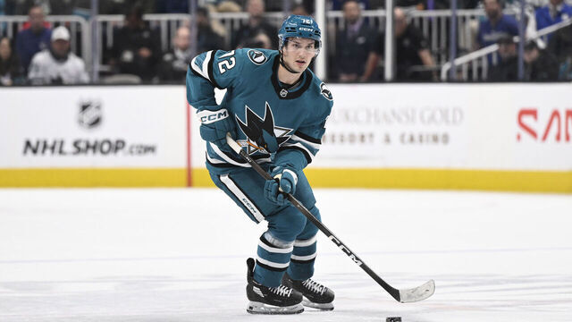 SAN JOSE, CALIFORNIA - APRIL 11: William Eklund #72 of the San Jose Sharks controls the puck against the Vancouver Canucks in overtime at SAP Center on April 11, 2026 in San Jose, California.